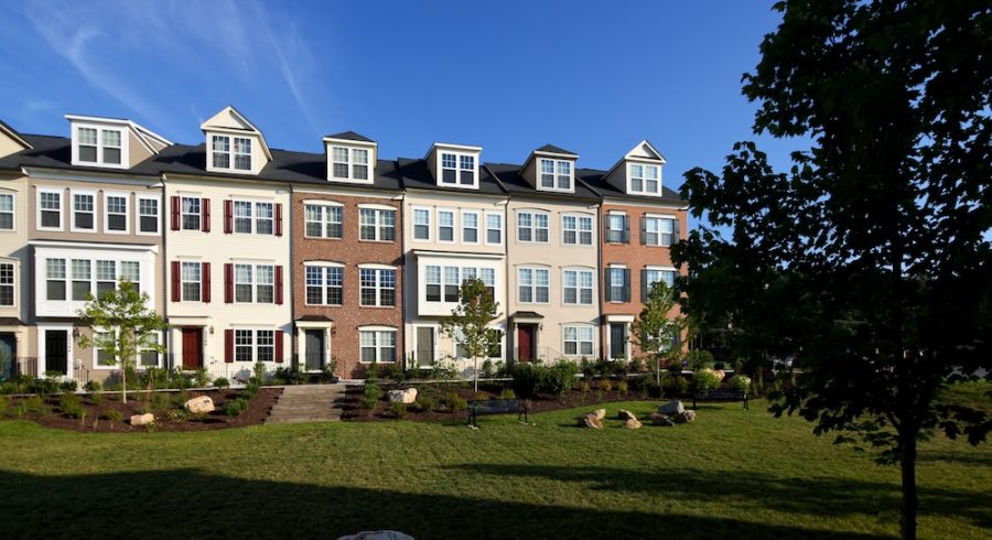 Adorable townhomes surrounded by a beautifully landscaped and inviting yard.