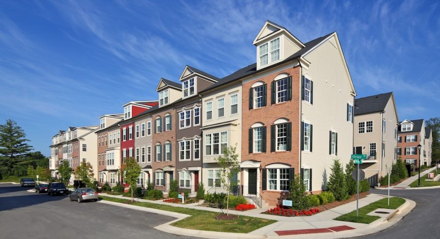A serene view of a charming neighborhood adorned with townhomes.