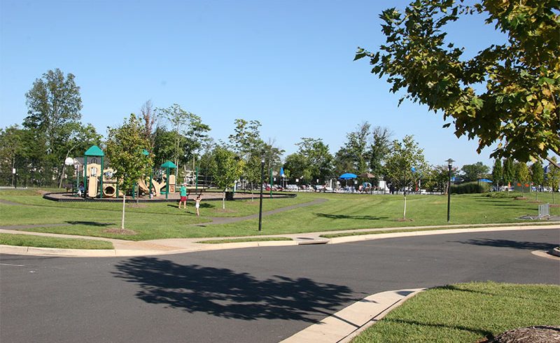 Playground Adjacent to Community Center - A vibrant playground located next to a welcoming community center.