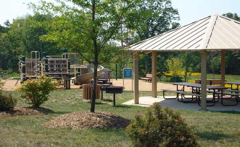 Playground with Picnic Tables Creates Perfect Moments of Fun and Leisure