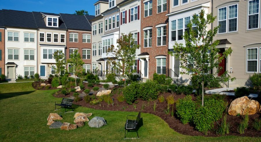 Charming Townhomes, Landscaped Yard, and Inviting Benches